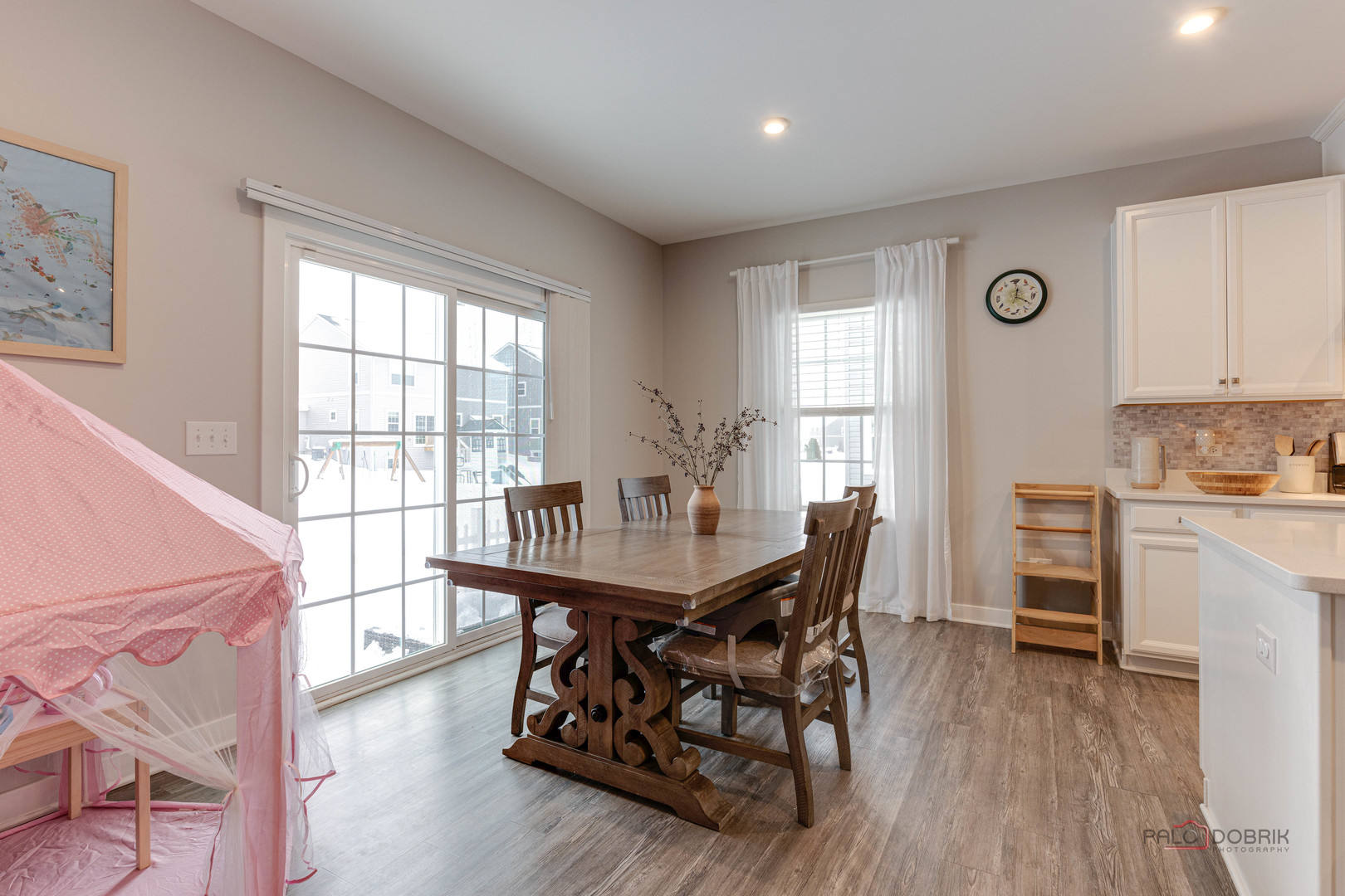 1799 Overview Circle Antioch, IL 60002 - Photo 13 of 38 a view of a dining room with furniture window and wooden floor