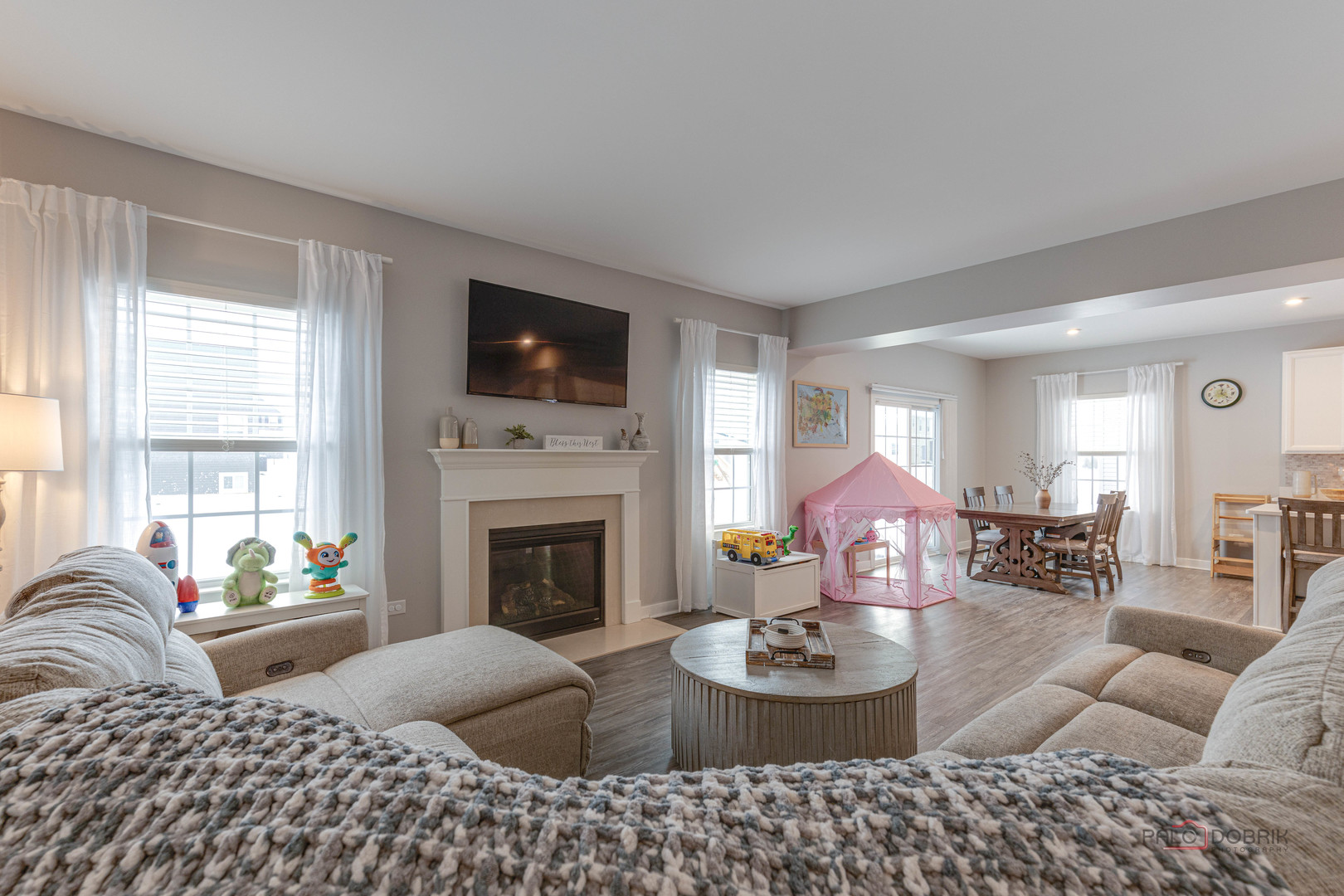 1799 Overview Circle Antioch, IL 60002 - Photo 16 of 38 a living room with furniture a fireplace and a flat screen tv