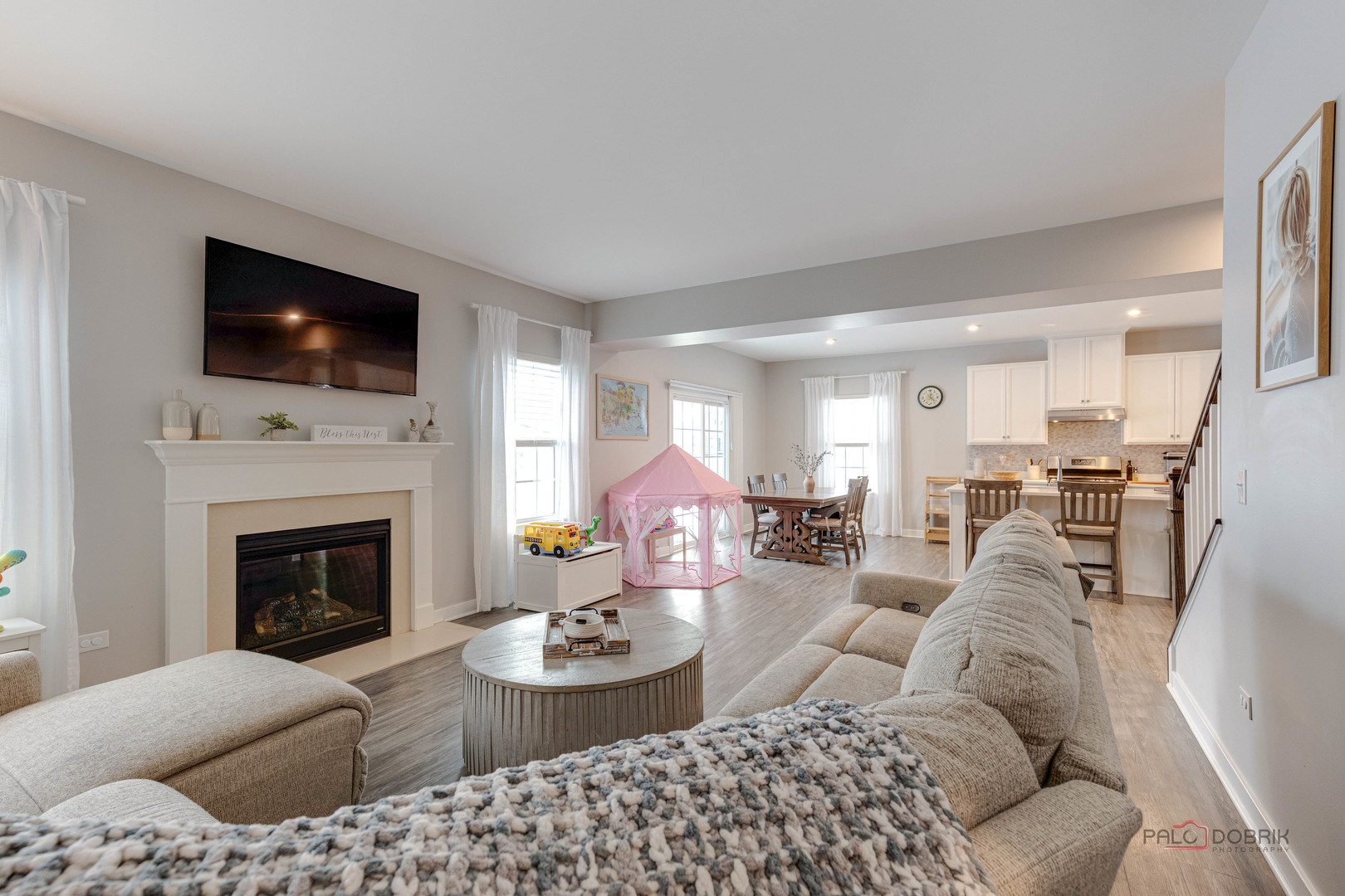 1799 Overview Circle Antioch, IL 60002 - Photo 17 of 38 a living room with furniture fireplace and a flat screen tv