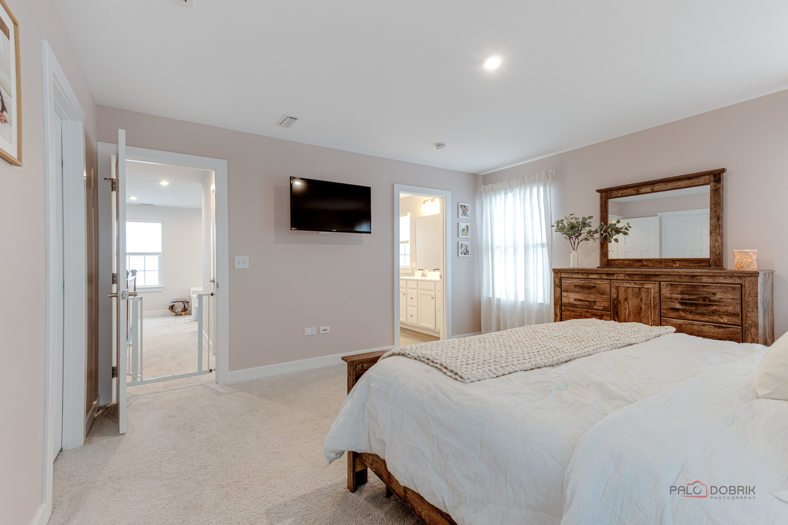 1799 Overview Circle Antioch, IL 60002 - Photo 23 of 38 a bedroom with a bed and a flat screen tv