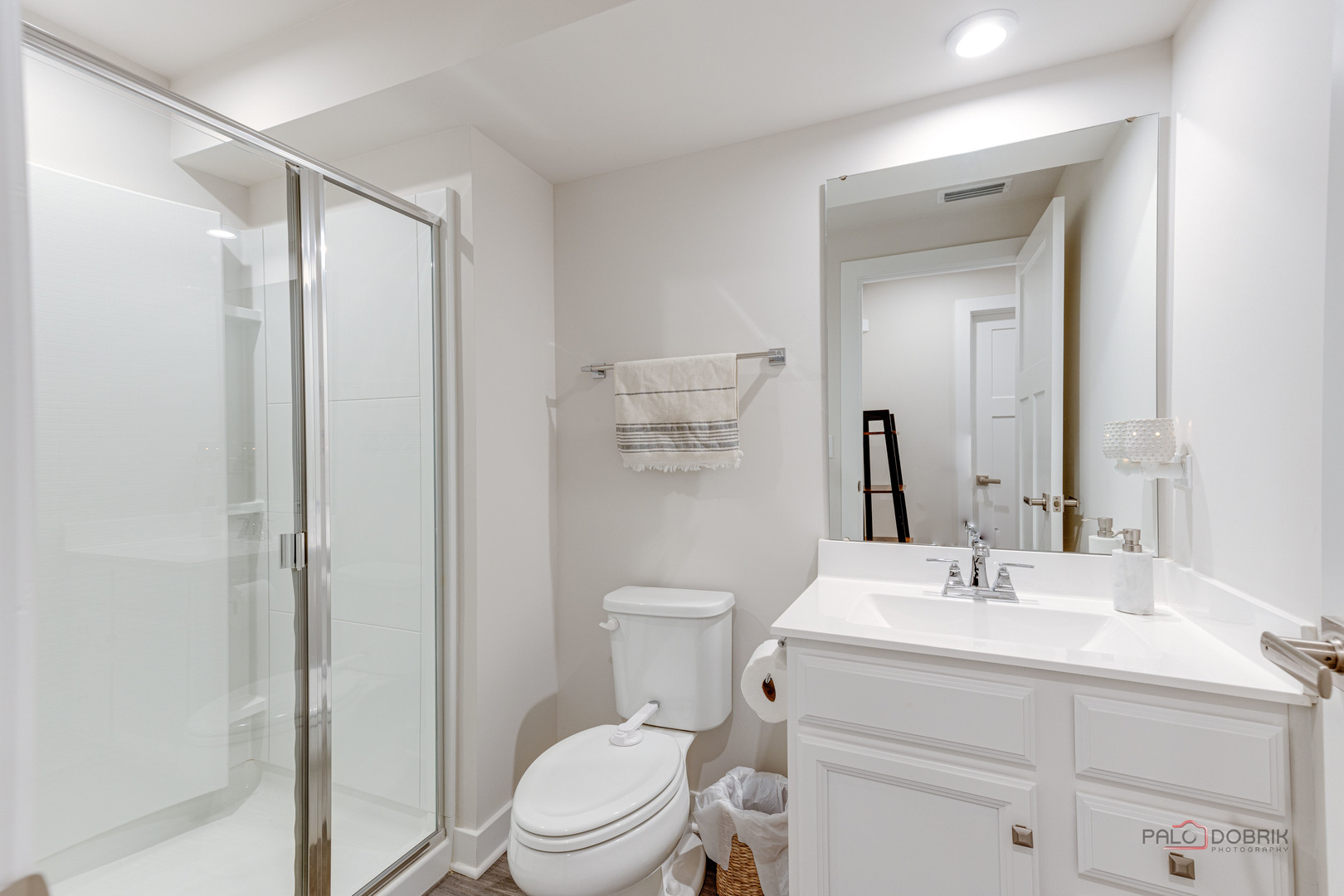 1799 Overview Circle Antioch, IL 60002 - Photo 32 of 38 a bathroom with a sink a toilet a mirror and shower