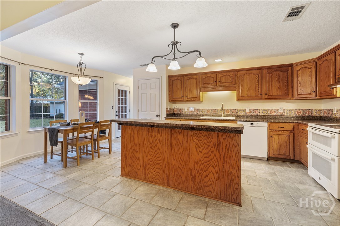 131 Crystal Drive Rincon, GA 31326 - Photo 21 of 51 Tile floors and tons of cabinets!