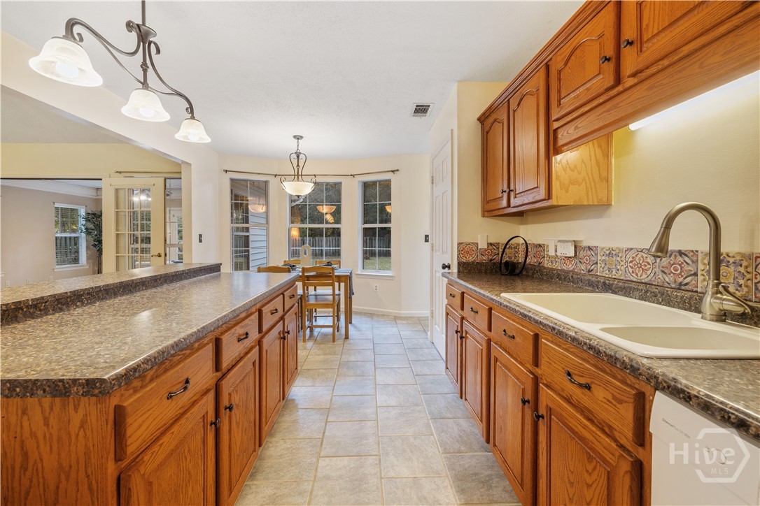 131 Crystal Drive Rincon, GA 31326 - Photo 25 of 51 All the cabinets from another view...