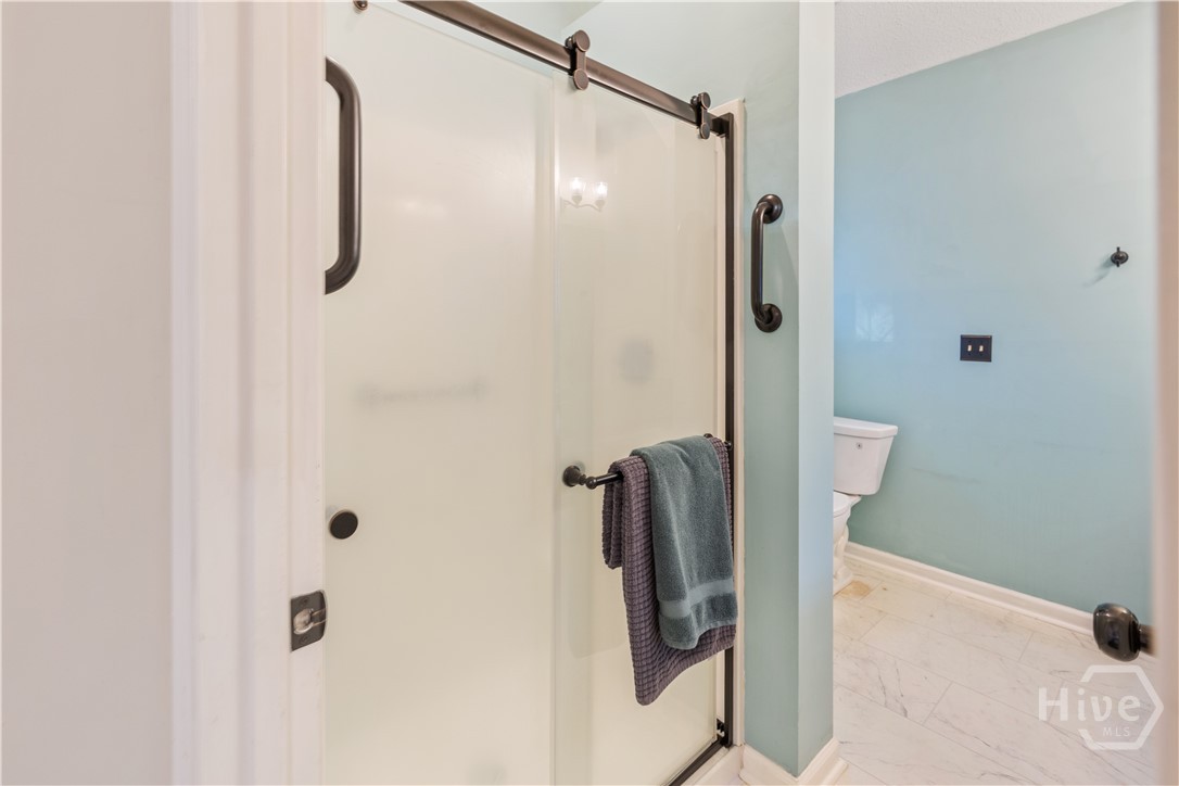 131 Crystal Drive Rincon, GA 31326 - Photo 33 of 51 Bright walk-in shower with a clean, modern feel.