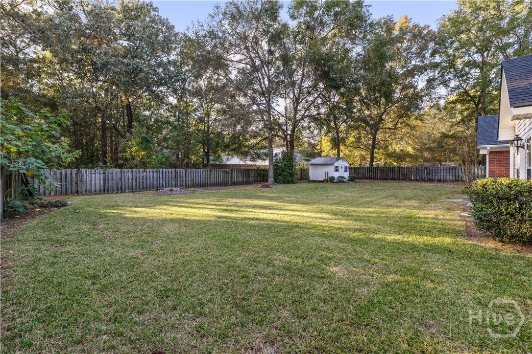 131 Crystal Drive Rincon, GA 31326 - Photo 41 of 51 Wide, open yard with endless possibilities. And the shed stays!