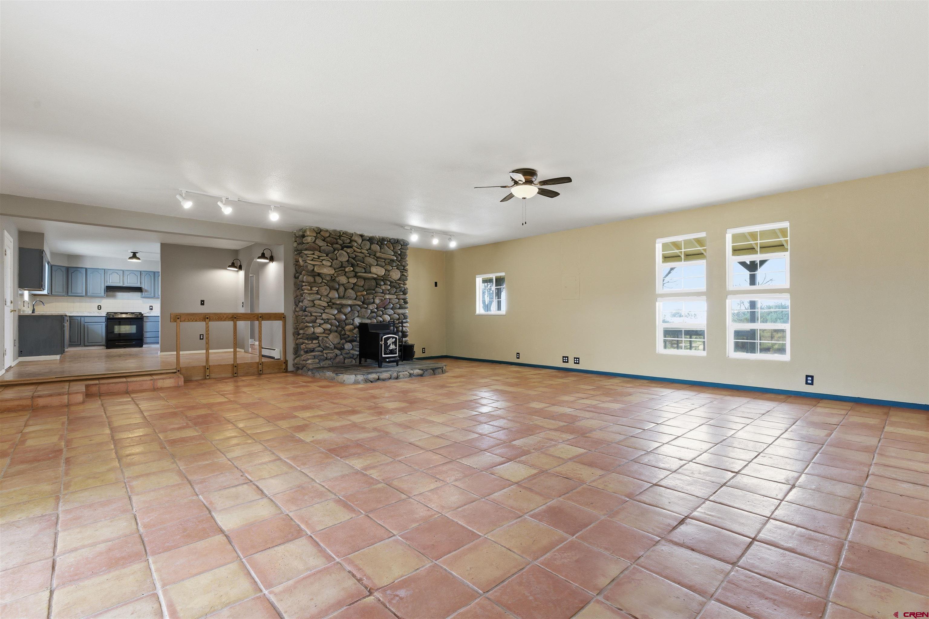 16216 2600th Road Cedaredge, CO 81413 - Photo 10 of 45 a view of a livingroom with furniture and a window