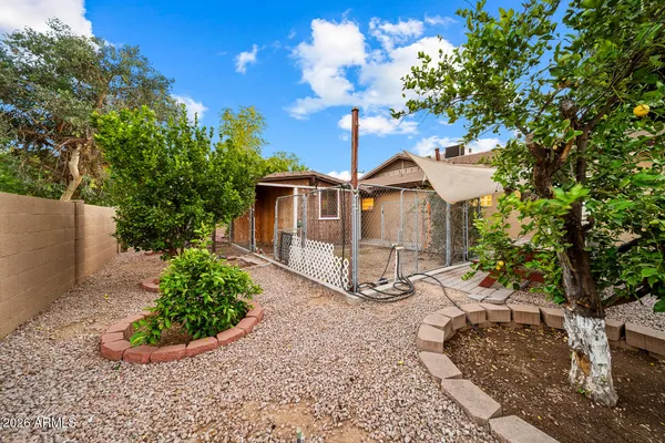 a bathroom with a double vanity sink a mirror a bathtub and shower