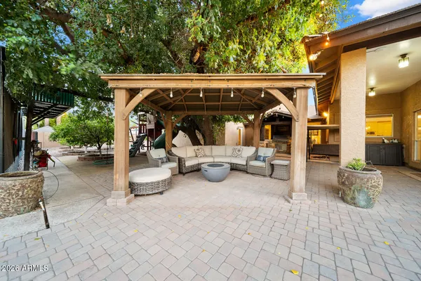 a view of a hallway view with wooden floor and staircase