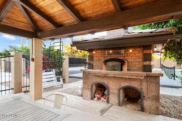 a room with gym equipment and a flat screen tv