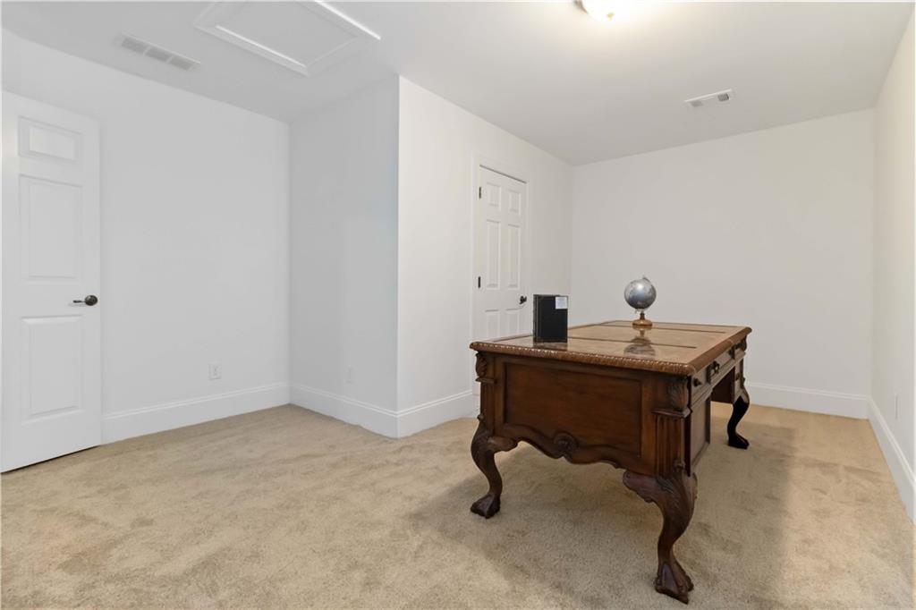 3320 Spencer Street Cumming, GA 30041 - Photo 42 of 90 a view of a workspace with a sink
