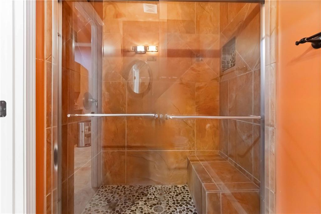 3320 Spencer Street Cumming, GA 30041 - Photo 53 of 90 a bathroom with a shower