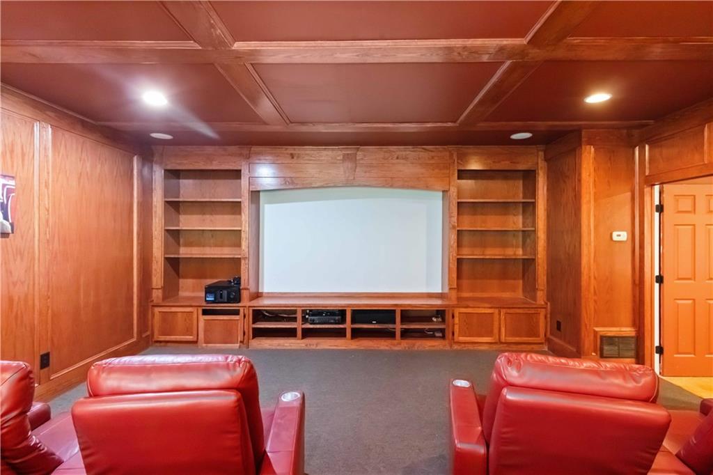 3320 Spencer Street Cumming, GA 30041 - Photo 57 of 90 a room with furniture and a flat screen tv