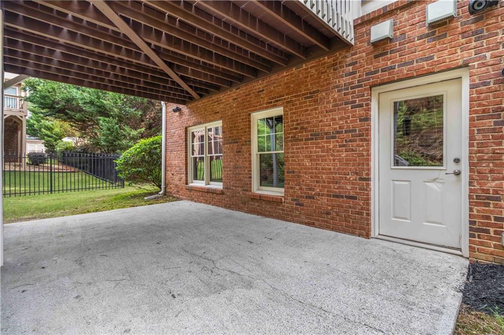 3320 Spencer Street Cumming, GA 30041 - Photo 68 of 90 a view of a house with backyard and porch