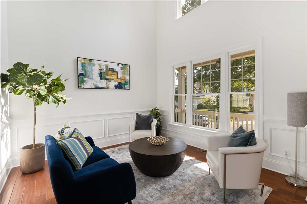 3320 Spencer Street Cumming, GA 30041 - Photo 8 of 90 a living room with furniture and a potted plant