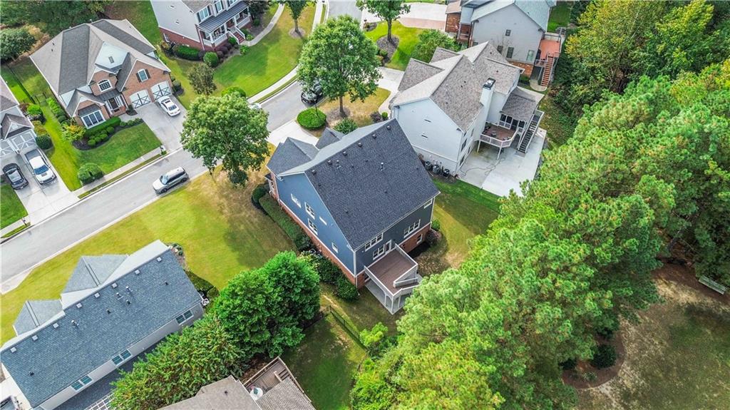 3320 Spencer Street Cumming, GA 30041 - Photo 81 of 90 an aerial view of a house with a garden