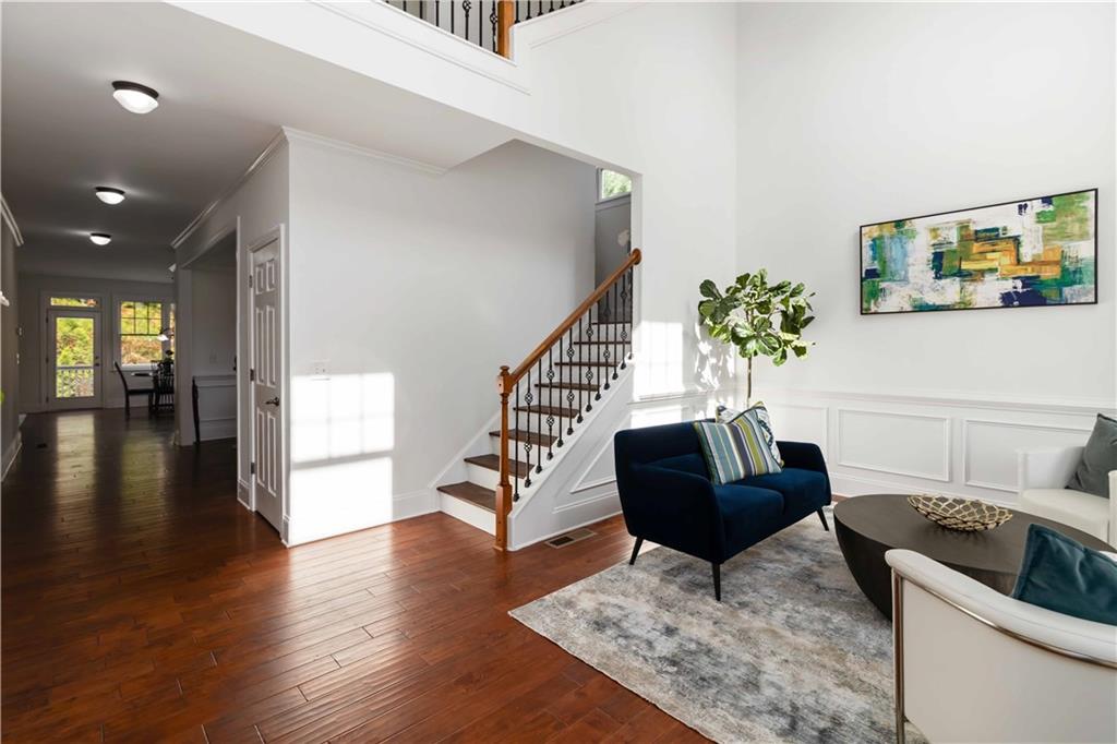3320 Spencer Street Cumming, GA 30041 - Photo 9 of 90 a living room with furniture and wooden floor