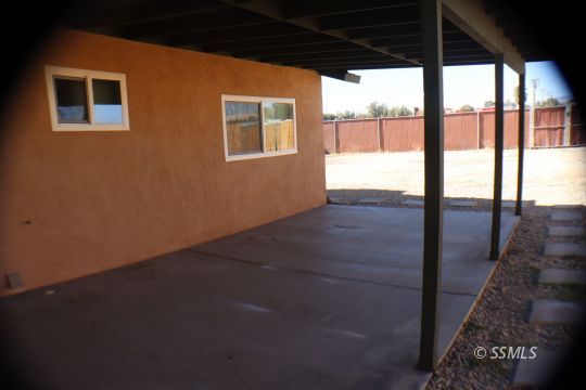 329 Lenore Street Ridgecrest, CA 93555 - Photo 24 of 28 a view of an empty room with a window