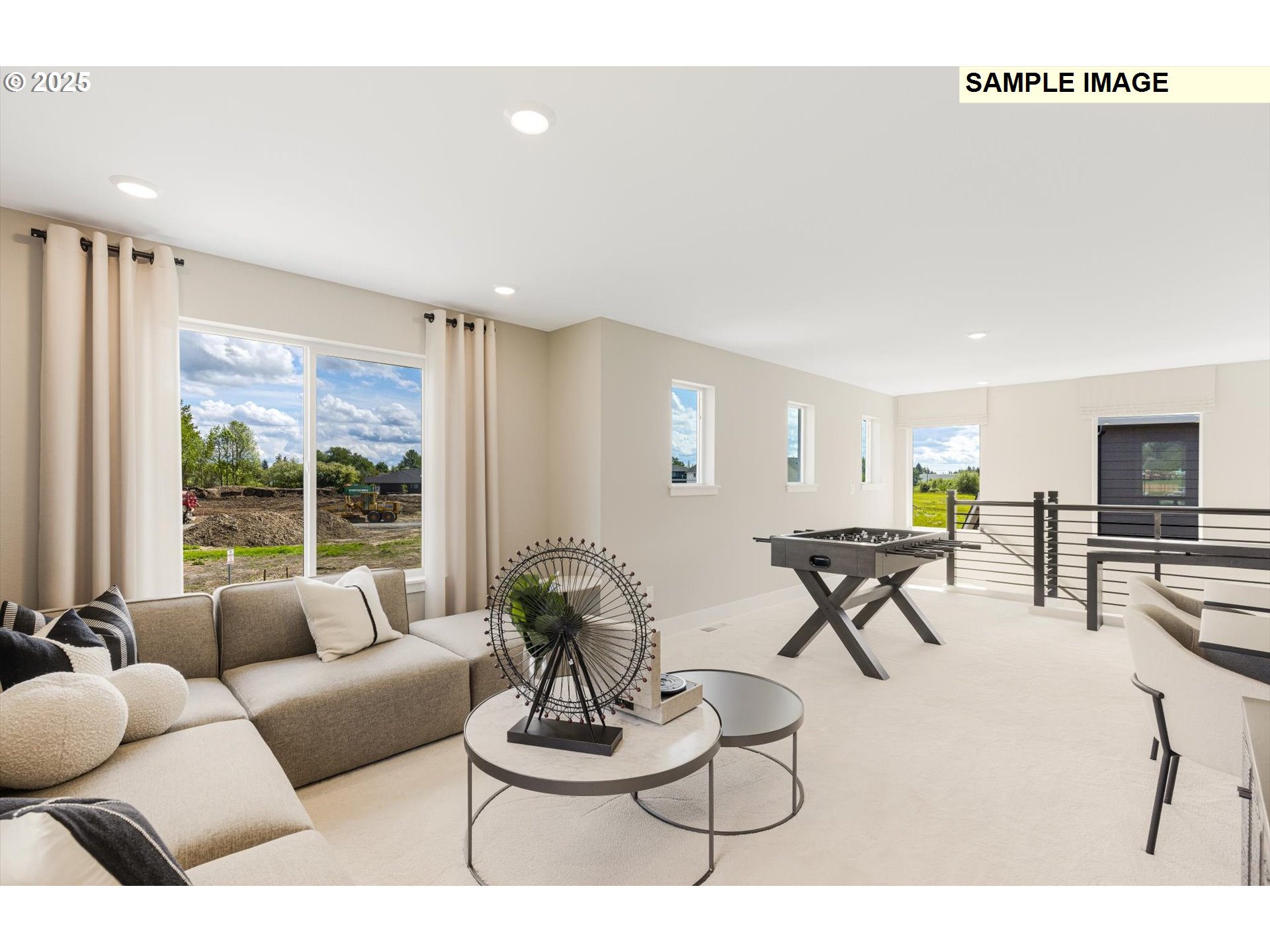 360 South 88th Avenue Ridgefield, WA 98642 - Photo 11 of 23 a living room with furniture and a large window