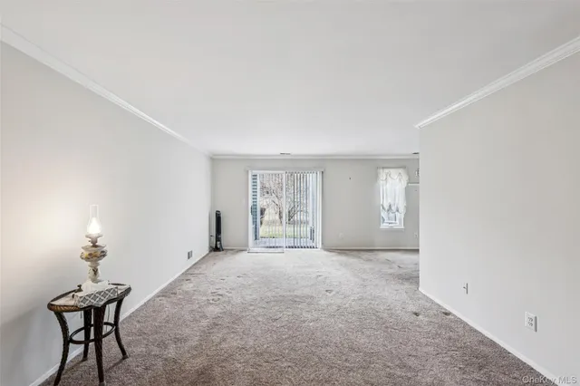a big room with windows and closet