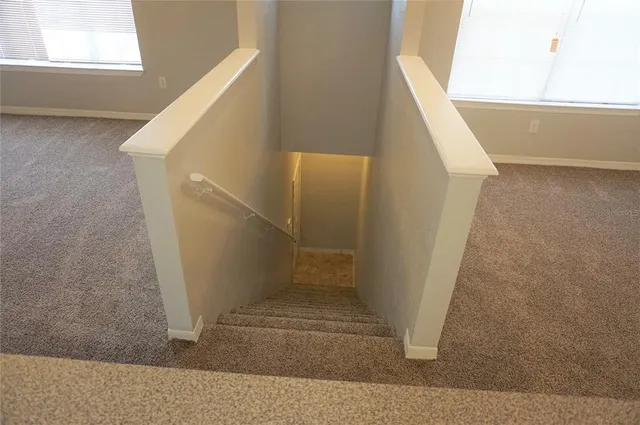 a view of hallway with stairs