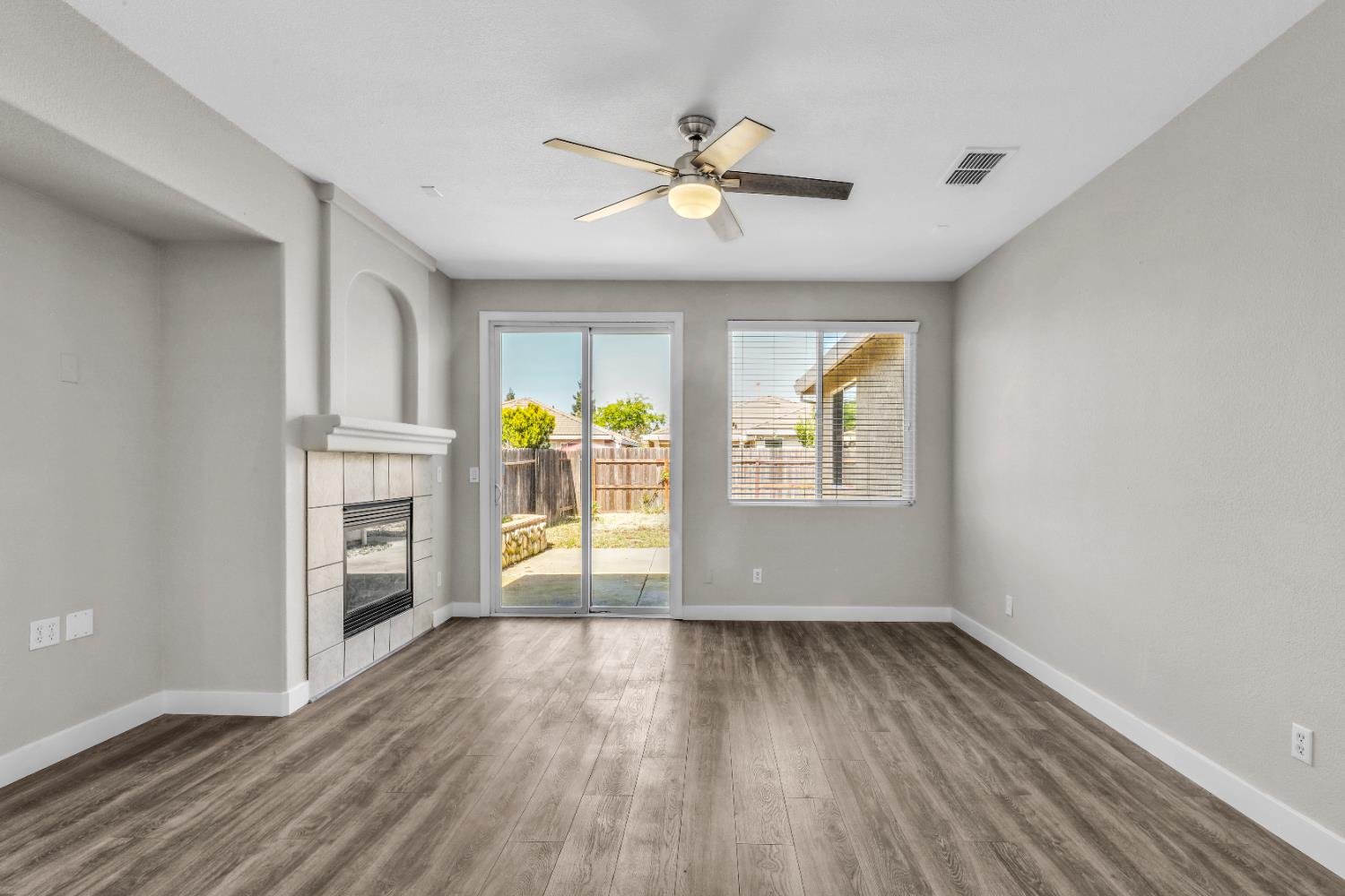 1839 Dawnelle Way Sacramento, CA 95835 - Photo 23 of 56 wooden floor in an empty room with a window