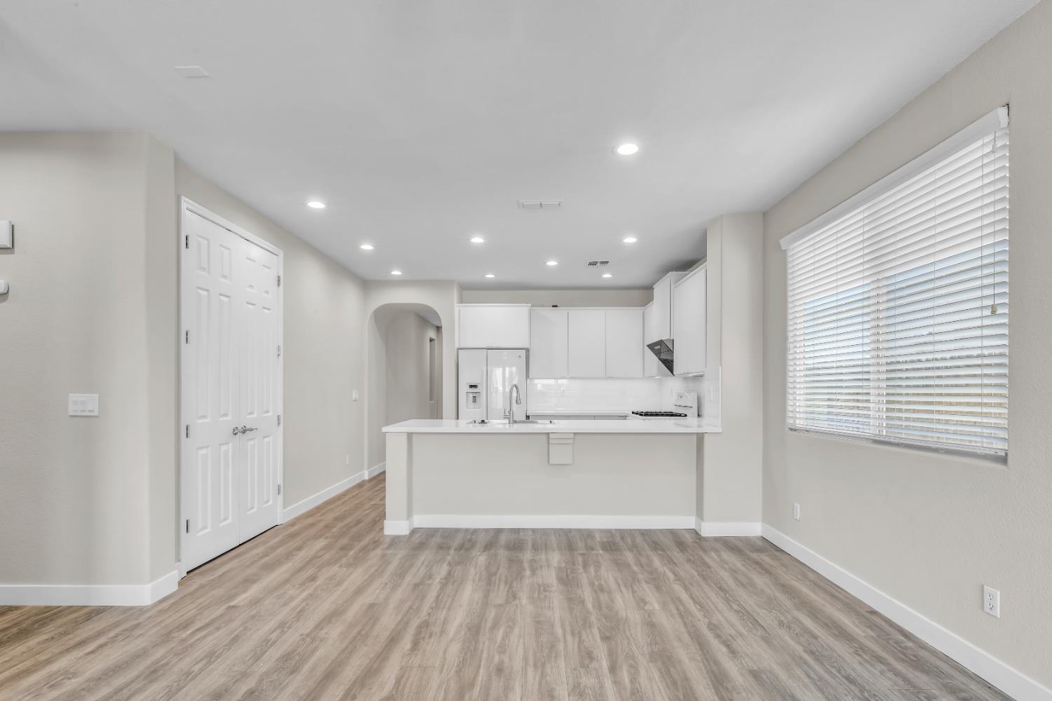 1839 Dawnelle Way Sacramento, CA 95835 - Photo 26 of 56 a view of kitchen with wooden floor and window