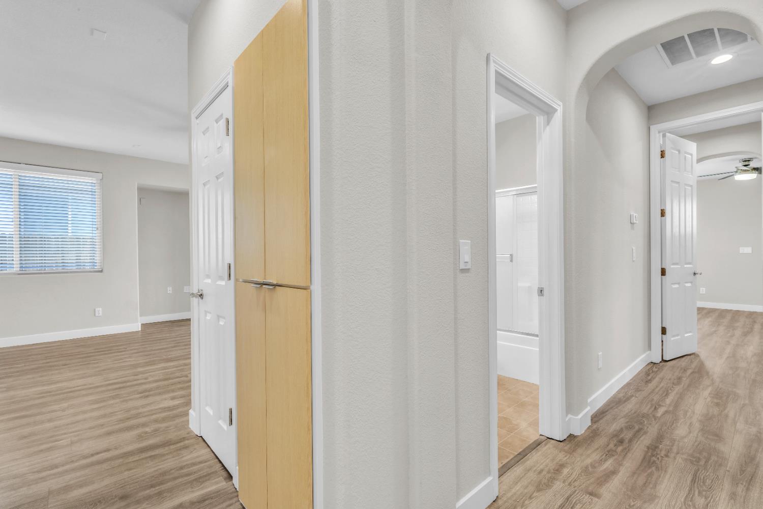 1839 Dawnelle Way Sacramento, CA 95835 - Photo 28 of 56 a view of a hallway with wooden floor and staircase