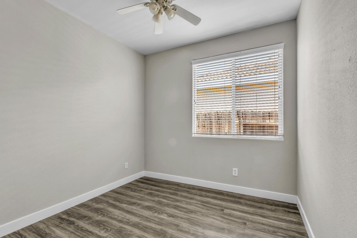 1839 Dawnelle Way Sacramento, CA 95835 - Photo 34 of 56 wooden floor in an empty room with a window