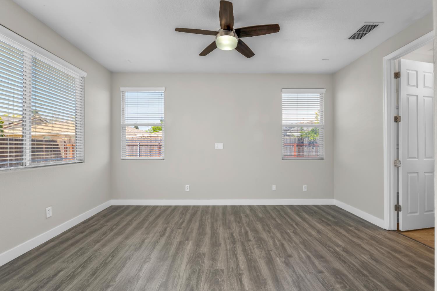 1839 Dawnelle Way Sacramento, CA 95835 - Photo 37 of 56 wooden floor in an empty room with a window