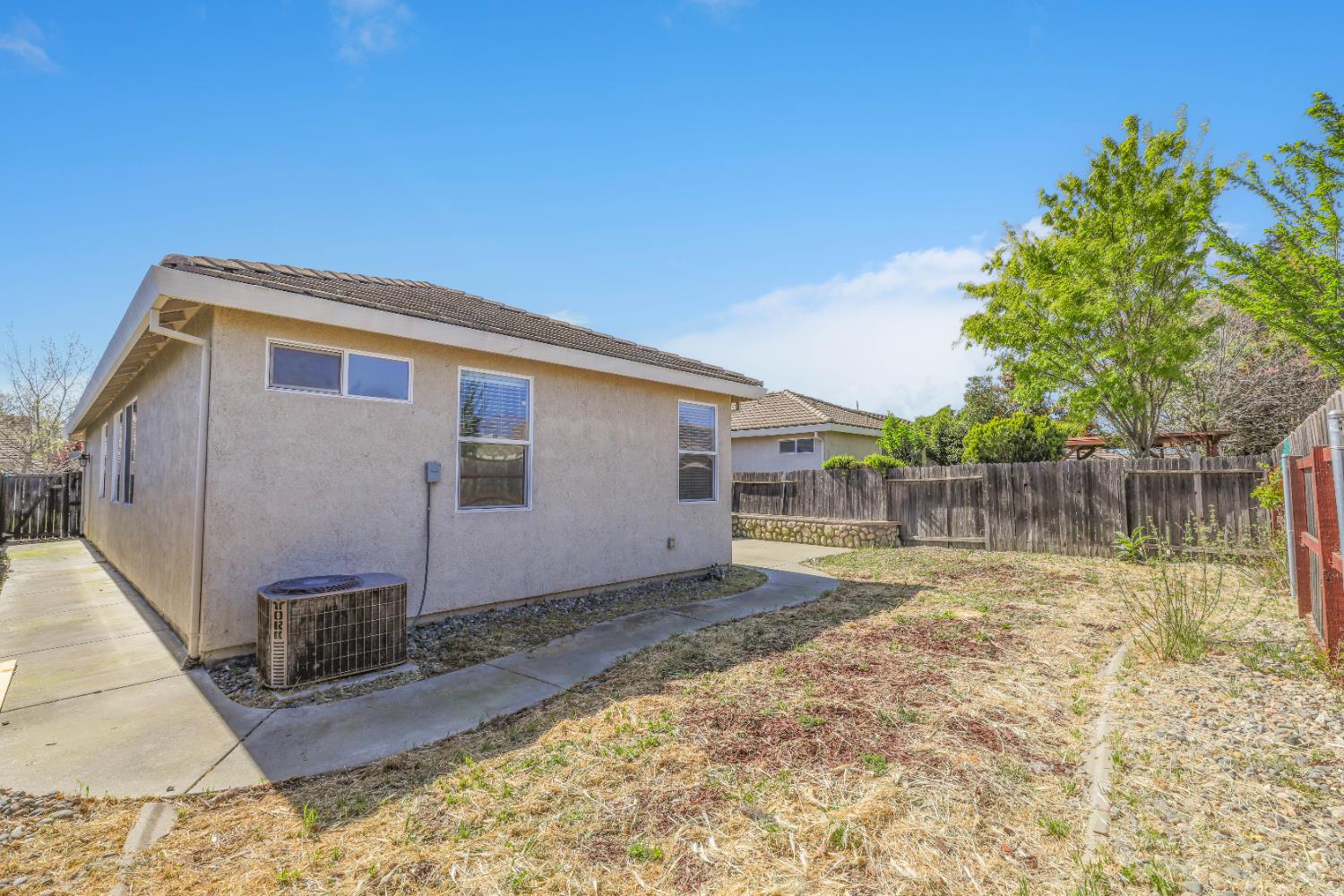 1839 Dawnelle Way Sacramento, CA 95835 - Photo 7 of 56 a backyard of a house with lots of green space