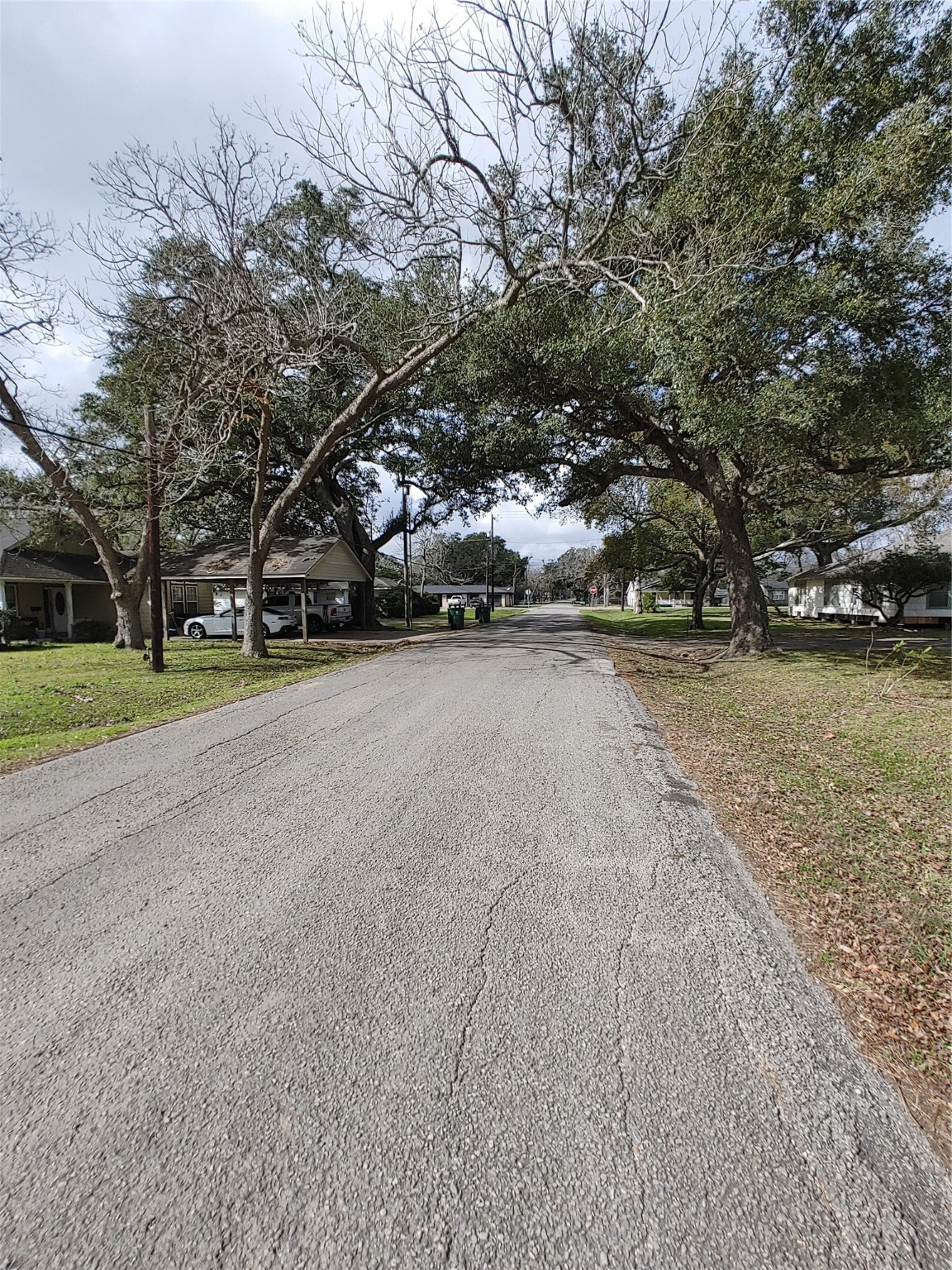 0 South Hackberry Street Sweeny, TX 77480 - Photo 6 of 6 a view of a lake with houses