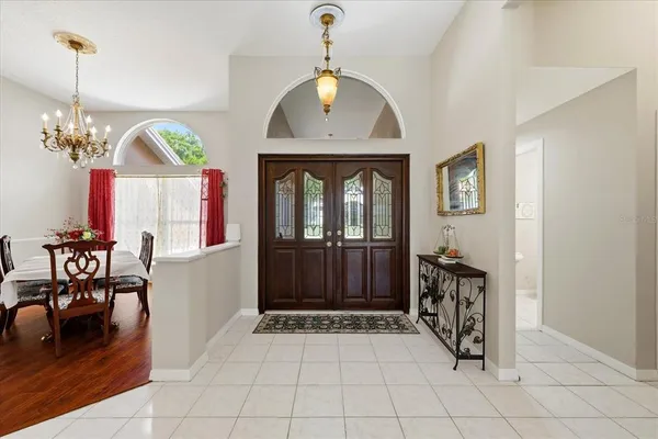 a view of a livingroom with furniture window and wooden floor