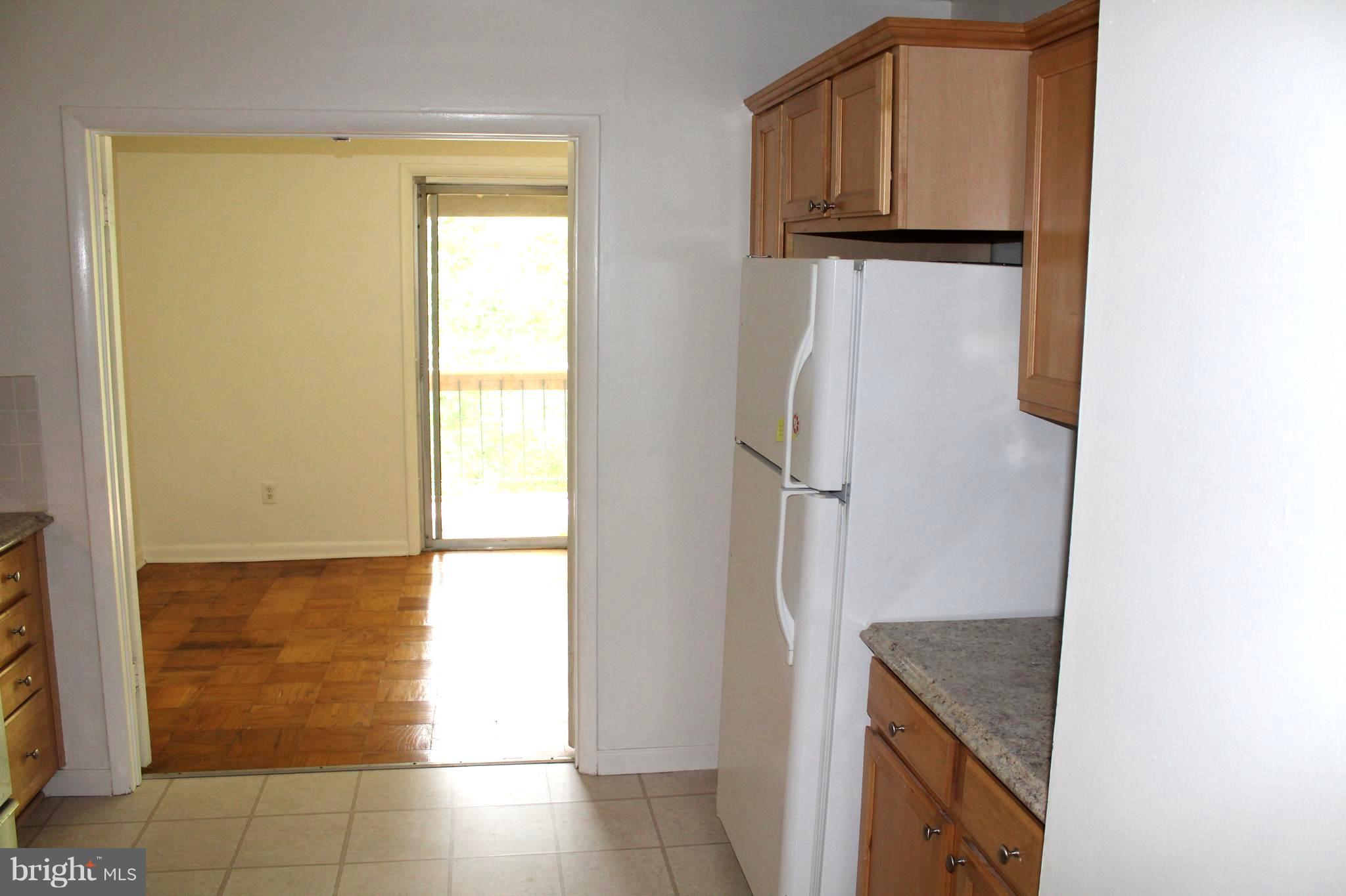 18 Cross Keys Road, Unit 18F Baltimore, MD 21210 - Photo 5 of 14 a view of walk in closet with window