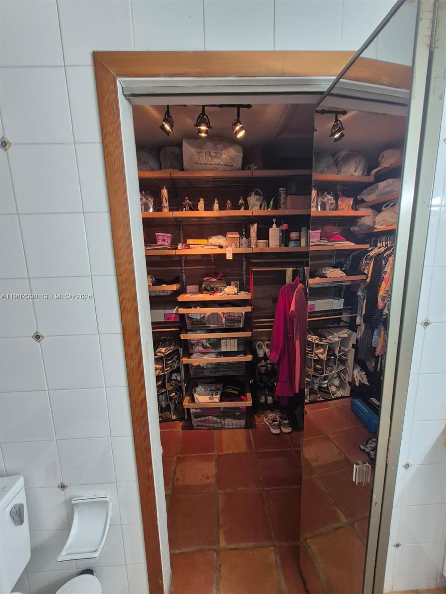 14530 Southwest 110th Street Miami, FL 33186 - Photo 20 of 45 a room with storage and utility