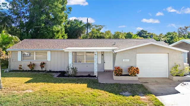 a view of a house with garden