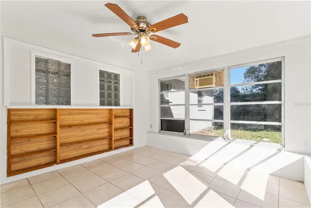 a bedroom with a bed and a cabinets