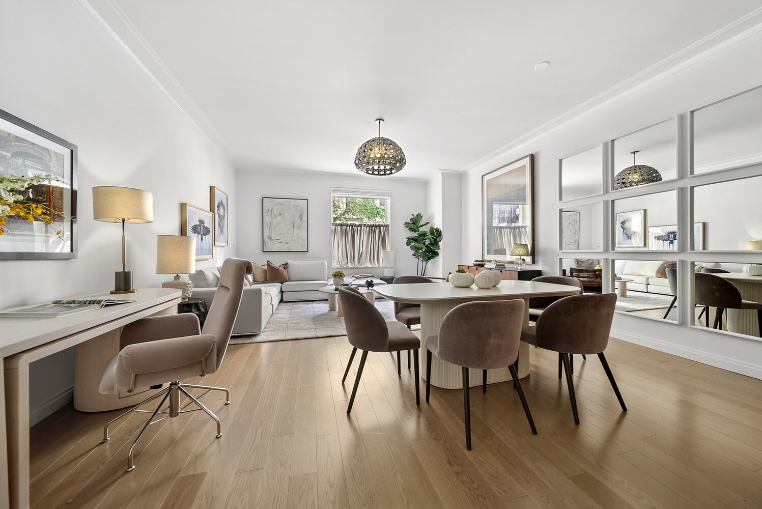 a view of a dining room with furniture window and wooden floor