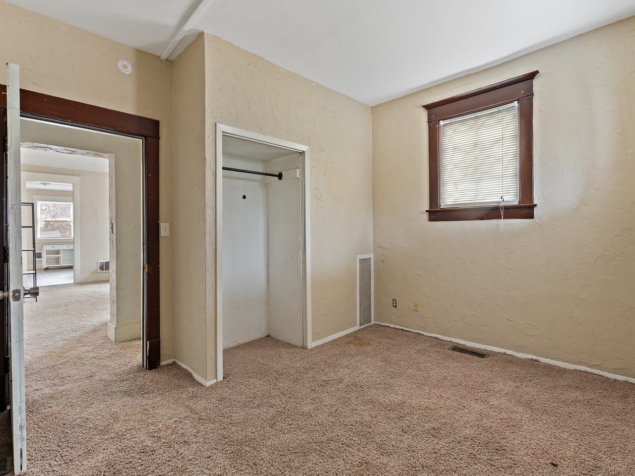 1546 12th Avenue Moline, IL 61265 - Photo 8 of 32 an empty room that has a large mirror