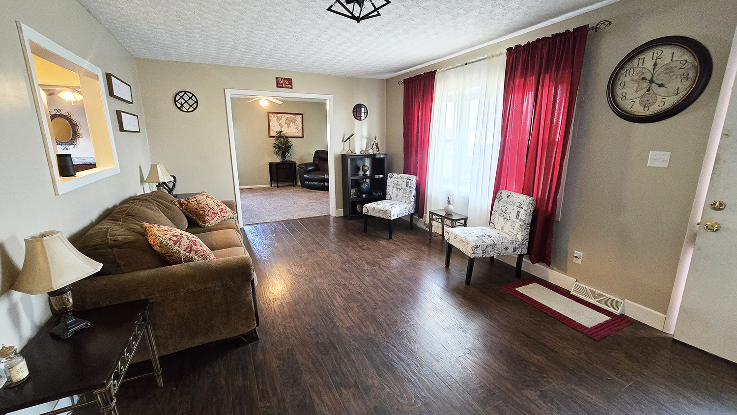 614 East Superior Street Irvington, IL 62848 - Photo 20 of 41 a living room with furniture a window and wooden floor