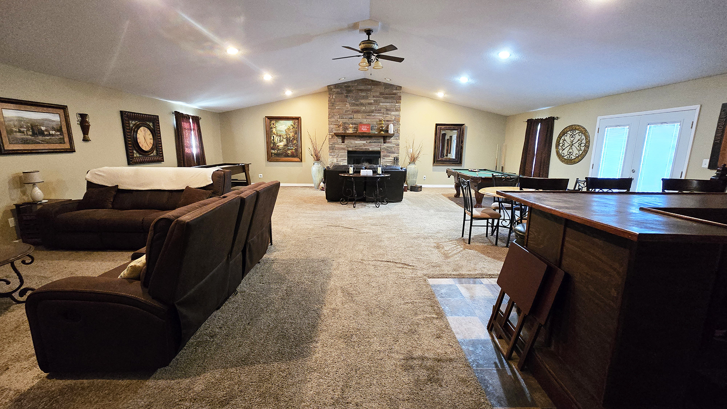 614 East Superior Street Irvington, IL 62848 - Photo 2 of 41 a living room with furniture a large window and a chandelier