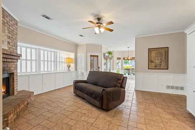 a kitchen with a refrigerator a stove a microwave and cabinets