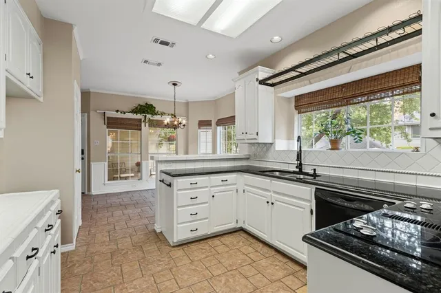a bathroom with a toilet a sink and a bathtub