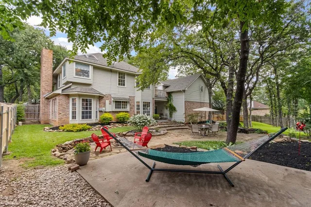 a backyard of a house with lots of green space