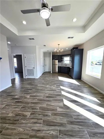 a view of a livingroom with a staircase