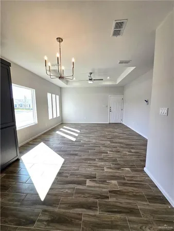 a view of an empty room and window