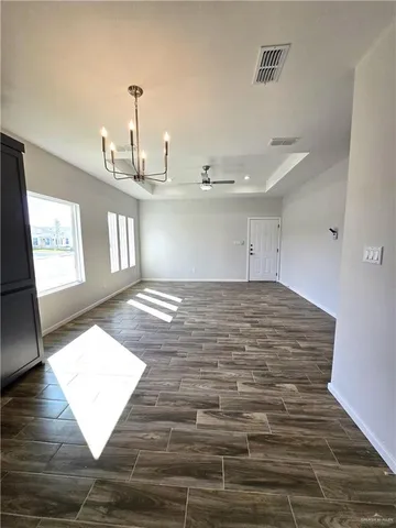 a view of an empty room and window