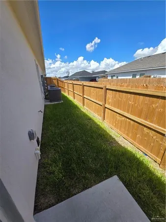 a view of a floor to ceiling window and an outdoor space