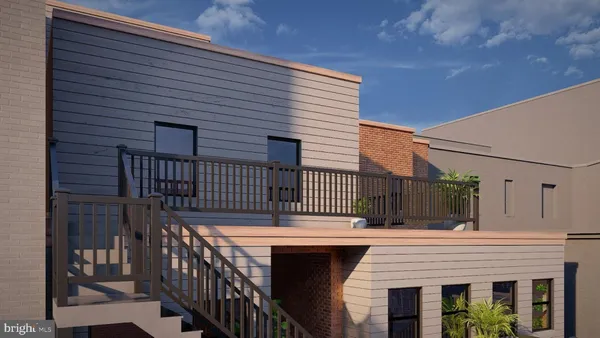 a view of house with a deck