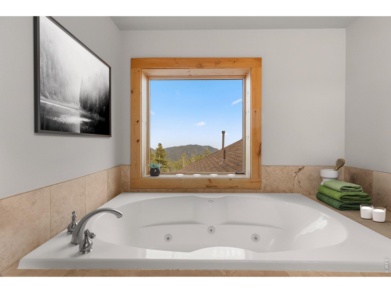 1028 Rudi Lane Golden, CO 80403 - Photo 33 of 46 a bathroom with a bathtub and a sink