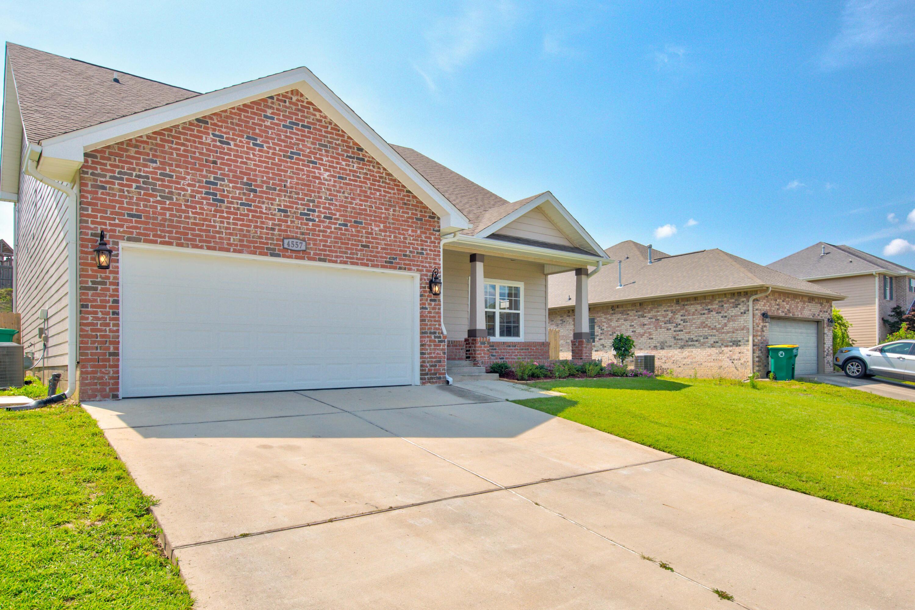 4557 Hermosa Road Crestview, FL 32539 - Photo 3 of 29 a front view of a house with garden